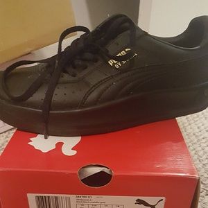 Black Puma sneakers